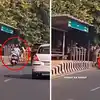 A woman fell from her scooter after colliding with roadside barricades ...