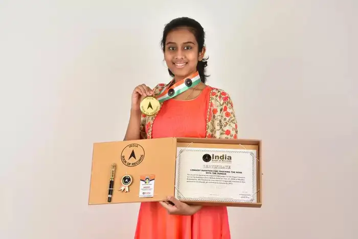 Devashree Thokle World Record,कोण आहे देवश्री ठोकळे? नाकाला जीभ लावून ...