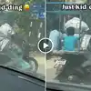 Man Rides Bike With 2 Children Sitting In Poultry Cage Video,मिडिल ...