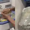 Viral Video of Train: ट्रेन में जूठे फूड कंटेनर धो रहा था शख्स, IRCTC ने लिया एक्शन, यात्रियों की आंखें खोल देगा यह वायरल वीडियो