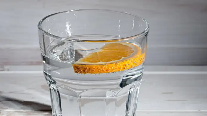 water with lemon slice
