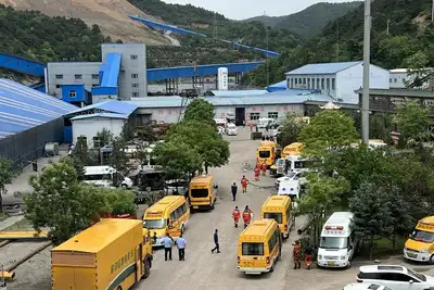 Rescuers work at the site following a gas explosion at Liushenyu coal mine