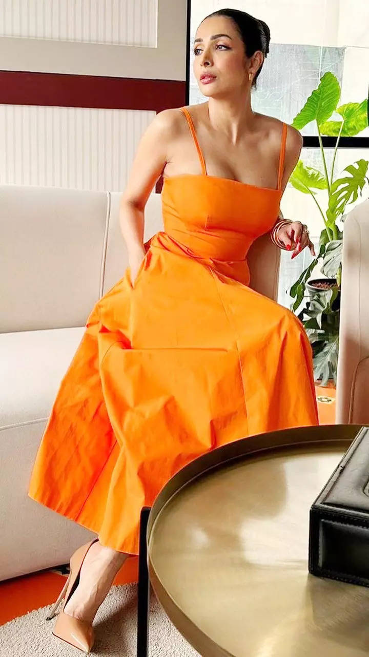 Malaika Arora is the epitome of summer style in vibrant orange dress | TOIPhotogallery