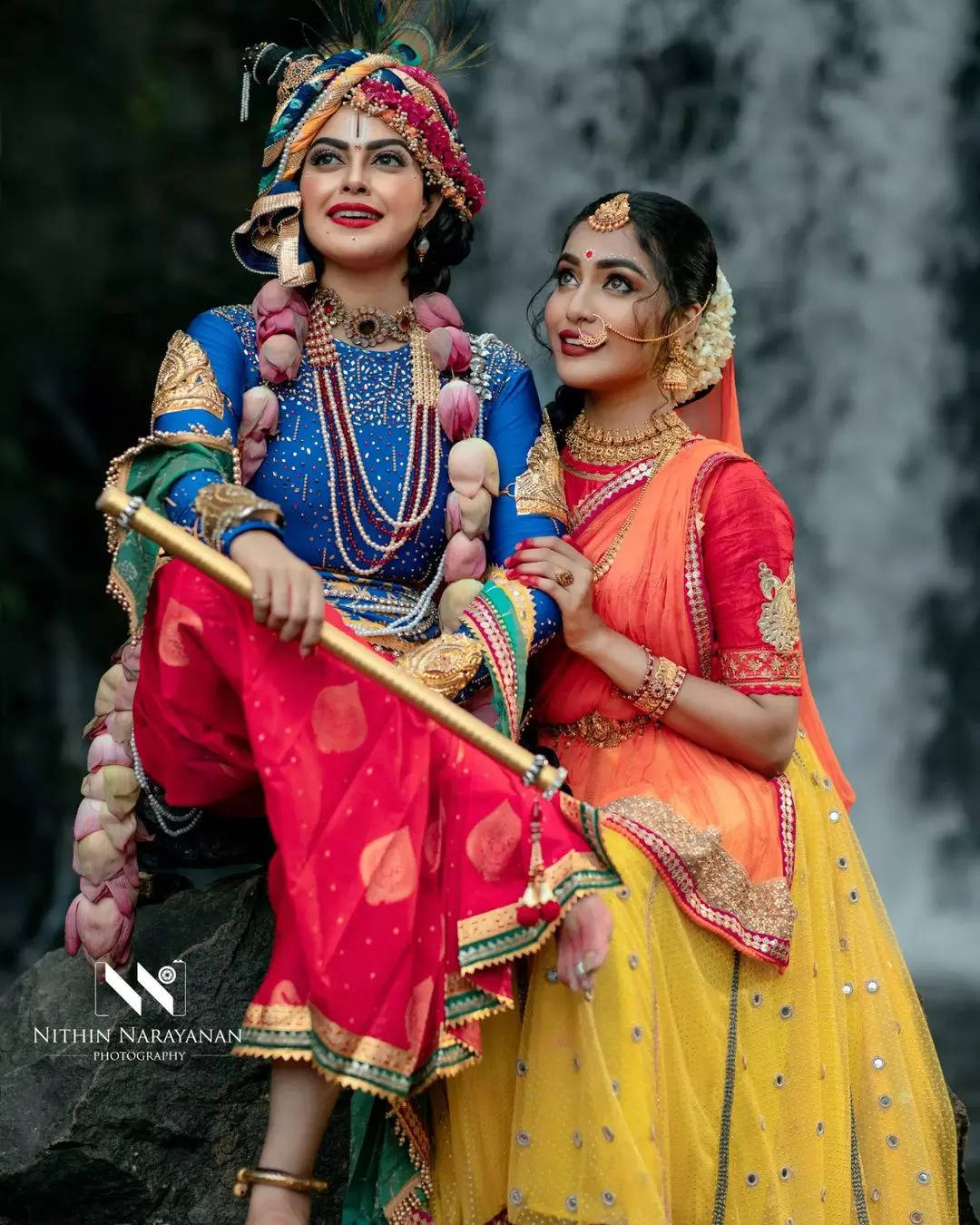 Image of Indian Mother With her Children Dressed Like Lord Sri Krishna And  Posing Over a Gray Background-TD010750-Picxy