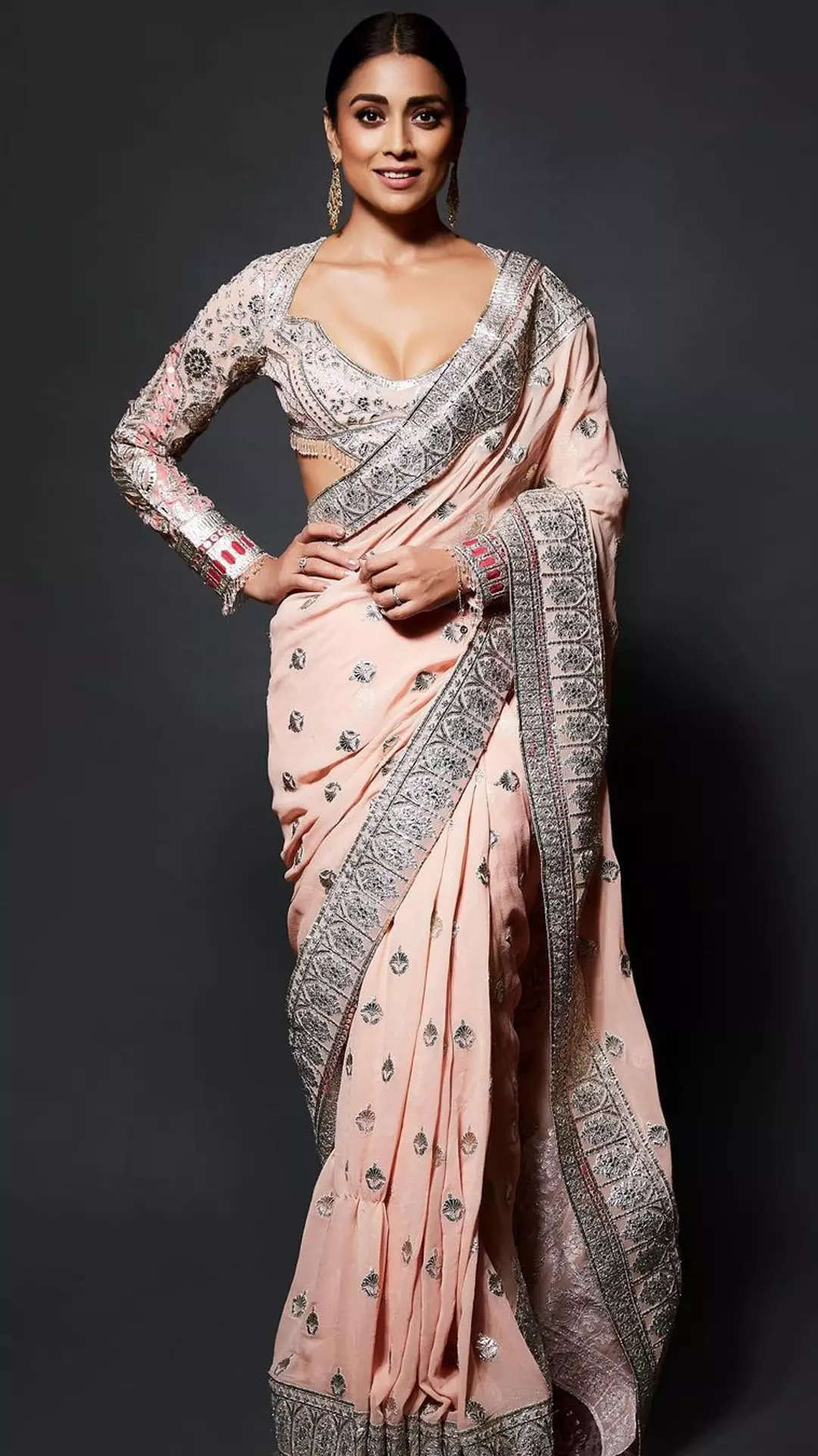 Photos] Shriya Saran stuns in peach heavy embroidered saree with deep neck blouse  design
