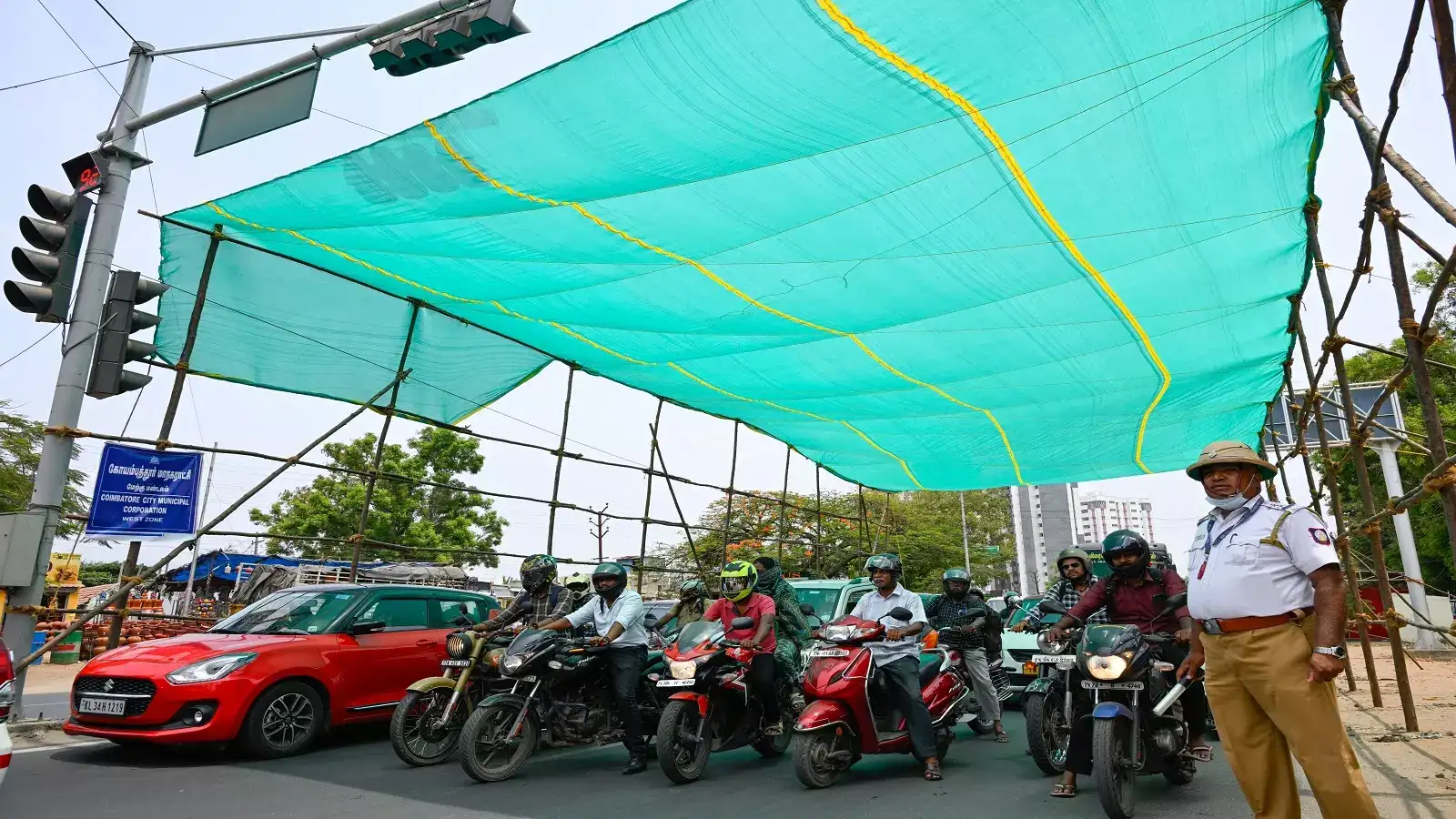 கோவை வாகன ஓட்டிகளுக்கு இனி கவலை இல்லை - வெயில் இருந்து தப்பிக்க புது முயற்சி! 