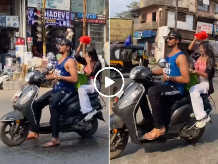 viral news girl and boy taking bath on moving scooty in ulhasnagar watch video viral news girl and boy taking bath on moving scooty in ulhasnagar watch video