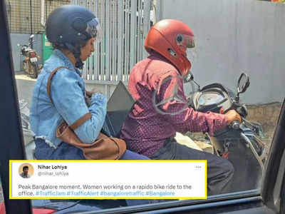 ये जाम काहे नहीं खत्म होता..., बेंगलुरु के ट्रैफिक में फंसी स्कूटी तो महिला वहीं लैपटॉप खोलकर काम करने लगी