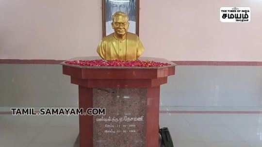 honoring marshall neshamani on his birthday by garlanding his statue