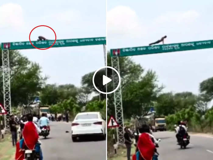viral video man push ups on towering signboard watch shocking video on yoga day viral video man push ups on towering signboard watch shocking video on yoga day