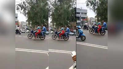 फिल्‍मी स्‍टाइल में महिला को बाइक पर उठाकर ले जा रहे थे दो लोग, वीडियो वायरल हुआ तो सामने आई हैरान करने वाली वजह