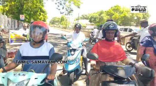 தலைக்கவசம் அணிந்தால் தக்காளி இலவசமா!