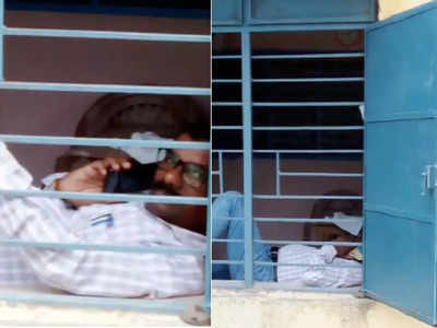 वर्गाच्या खिडकीत झोपून मोबाईलवर गप्पा, जिल्हा परिषद शाळेतील गुरुजींचा राजेशाही थाट, VIDEO
