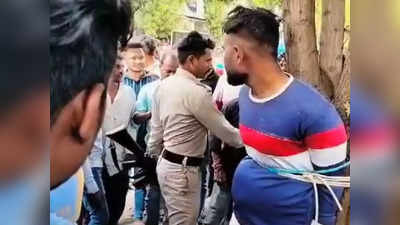 Indore News: चोरी के शक में तालिबानी सजा, दो युवकों को पेड़ से बांधकर पाइप से पीटा, बाल भी काटे
