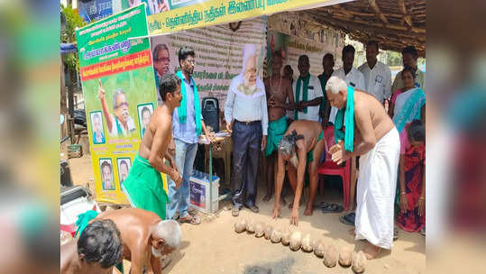 பிரதமர் மோடி போல் வேடமடைந்தவரின் காலில் விழுந்து விவசாயிகள் போராட்டம்!