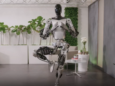 Elon Musk नं दाखवला Tesla Optimus रोबोट, नमस्ते बोलून करतोय Yoga