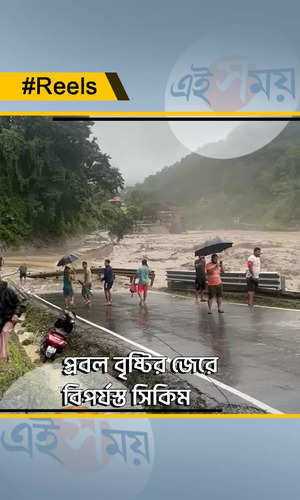 sikkim flash floods teesta river washes away a major part of national highway 10 and many army vehicles watch video