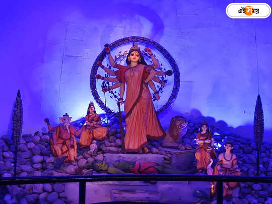 Durga Puja 2023 : নীলাভ আলোয় ঢাকা মণ্ডপ, নুড়ি-পাথরের ব্যবহারে নজর কাড়া প্যান্ডেল, দেখুন বড়িশা সর্বজনীনের ছবি 