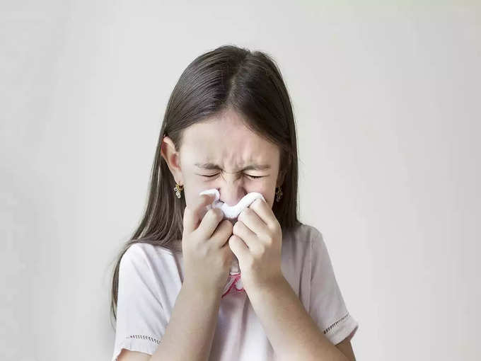 child sneezing