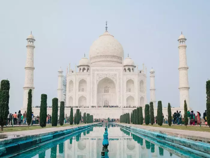 ताजमहल और डूबती नाव वाली तस्वीर और मूर्ति न दें