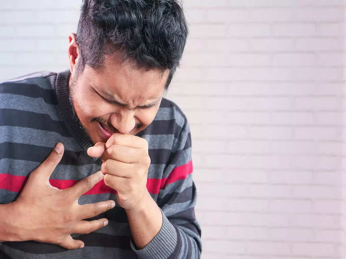 man coughing