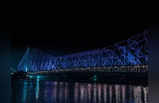 नीली रोशनी से क्‍यों नहाया हावड़ा ब्रिज? कोलकाता की दूसरी मशहूर जगहों पर भी गजब नजारें, देखें तस्‍वीरें