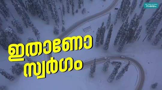 beautiful snowcovered roads and trees in jammu and kashmirs popular skiing destination in gulmarg