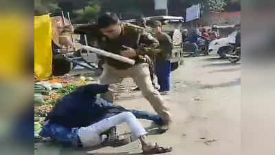 कानपुर में दारोगा ने बीच सड़क पर दो युवकों को डंडे से पीटा, बाल पकड़कर घसीटा, सोशल मीडिया पर वीडियो हुआ वायरल