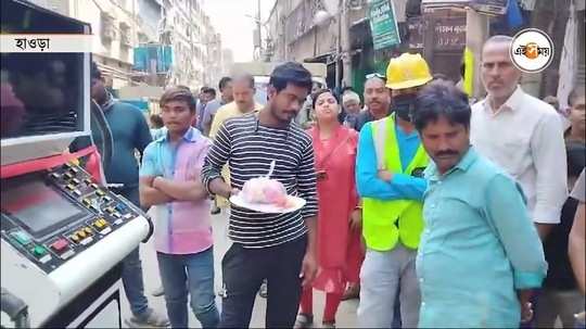 howrah municipality introduced robotic scavenger for manhole cleaning watch bengali video