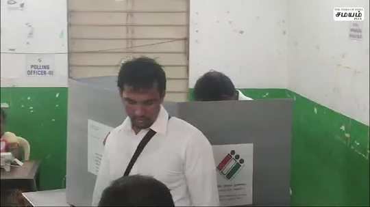 director hari and his wife cast his vote