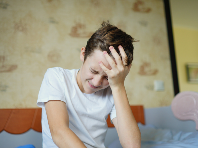teenager boy headache pain