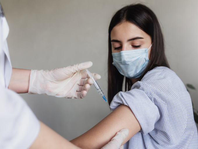 teenage girl vaccine injection