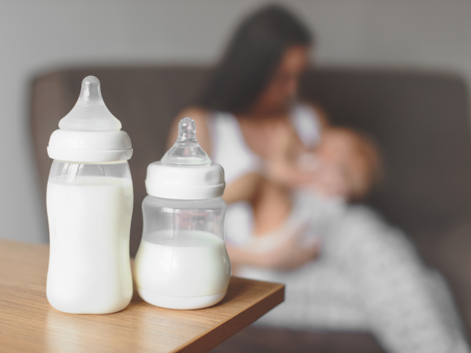 mother baby breastfeeding milk bottle