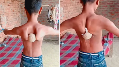 छोटे नवाब का बहादुरी करतब हुआ वायरल, लड़के ने पीठ की हड्डियों से फोड़ा सूखा नारियल, वीडियो चौंका देगा