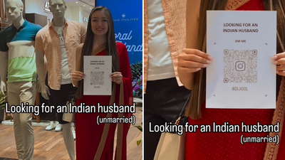 रशियन तरुणीला हवाय भारतीय नवरा, लग्न करण्यासाठी बोर्ड घेऊन मॉलमध्ये राहिली उभी, पाहा व्हायरल व्हिडीओ