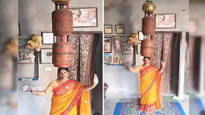 हरियाणवी महिला ने पंजाबी गाने पर किया सिलेंडर डांस, गर्दन की ताकत देख पब्लिक दंग रह गई, वीडियो वायरल