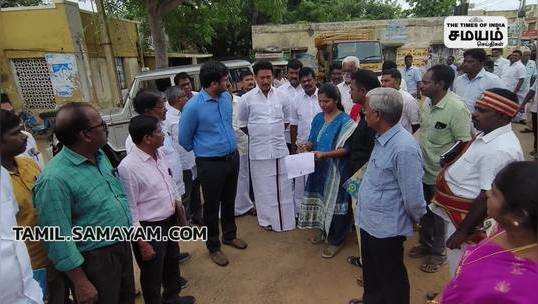 minister anbil mahesh inspects the new bus stand in tiruverumbur