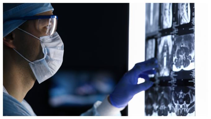 male doctor examining reporty edit istock