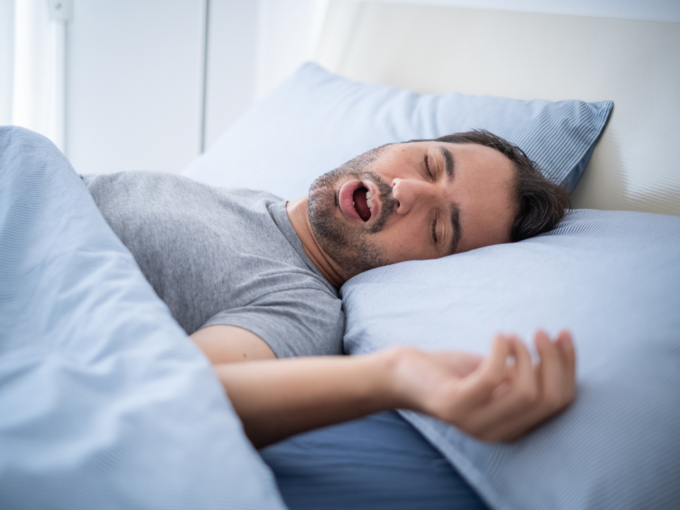 man snoring in sleep