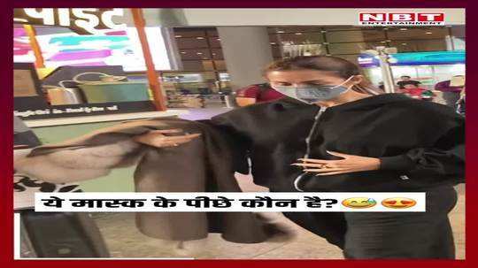 malaika arora spotted at the airport the actress hid her face behind a mask watch video