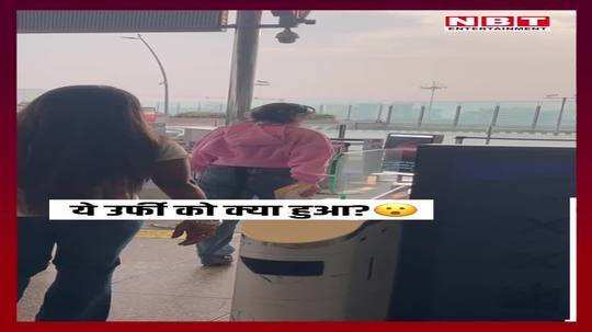 uorfi javed spotted at mumbai airport early in the morning unwell yet doing this work for paps watch video