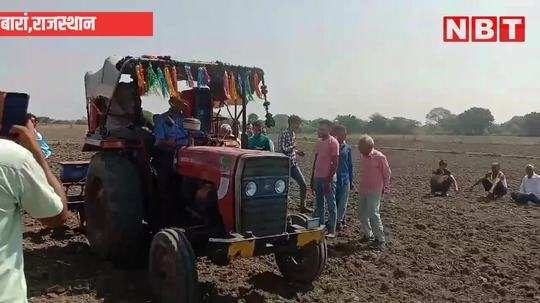 baran collector drove a tractor and sowed mustard seeds in the fields of melkhedi village