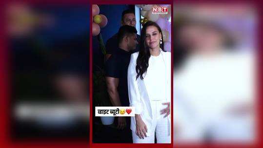 neha dhupia dazzles in white outfit inaugurates hair masters luxury salon in andheri