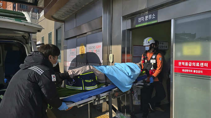 Plane burst into flames after skidding off runway at an airport in South Korea, killing at least 120