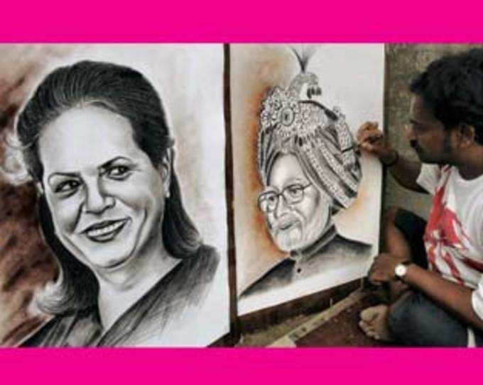 Pavement artist Ramjan Hussain busy to give final touch on the potraits of UPA Chairperson Sonia Gandhi and Prime Minister Manmohan Singh in Kolkata
