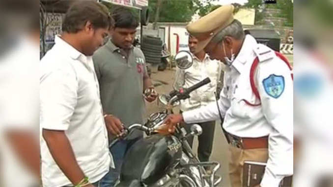 Traffic cop in Hyderabad provides needy riders with petrol