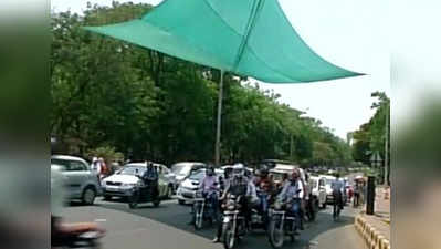 বাইকারদের স্বস্তি দিতে সিগন্যালে ছায়ার ব্যবস্থা