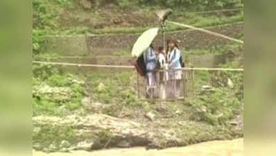 Watch: Children forced to use rope trolley to reach school 