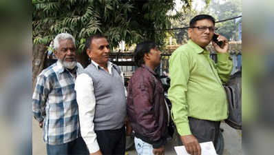 Senior citizens lined up outside banks to withdraw, exchange money 