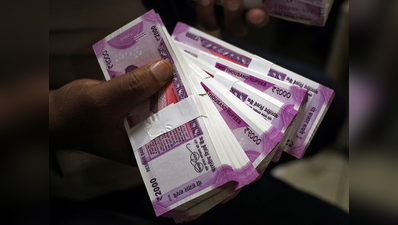 बेंगलुरुः आयकर विभाग की छापेमारी जारी, नई करंसी में 1.07 करोड़ रुपये बरामद